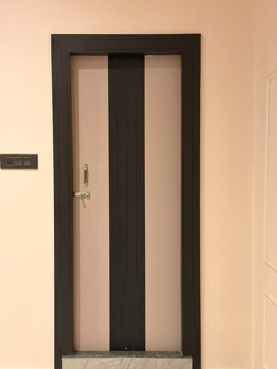 Custom two-tone interior door — The Silapathar Residence, Silapathar, Assam