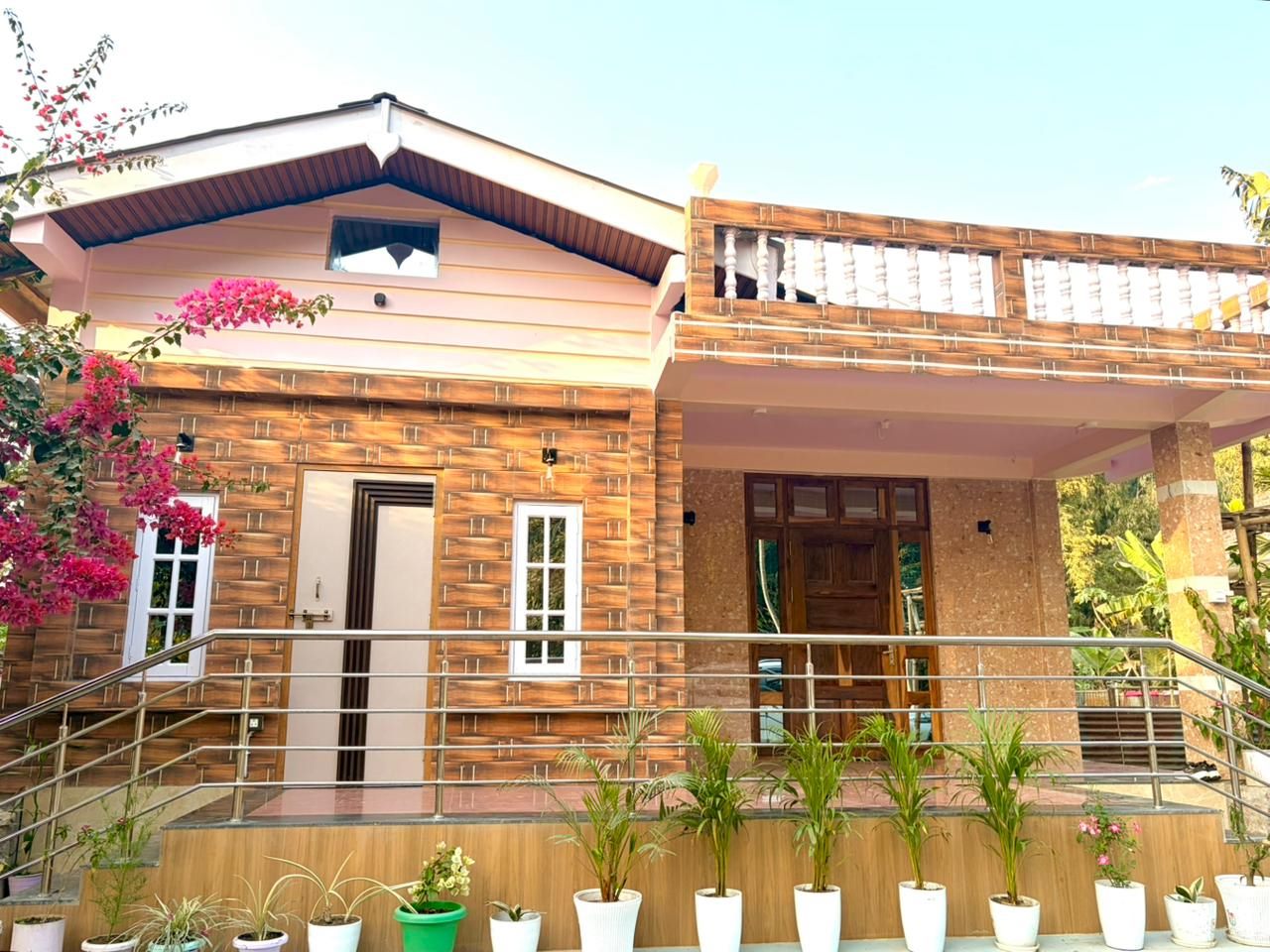 Daytime view of the completed facade — The Silapathar Residence, Silapathar, Assam