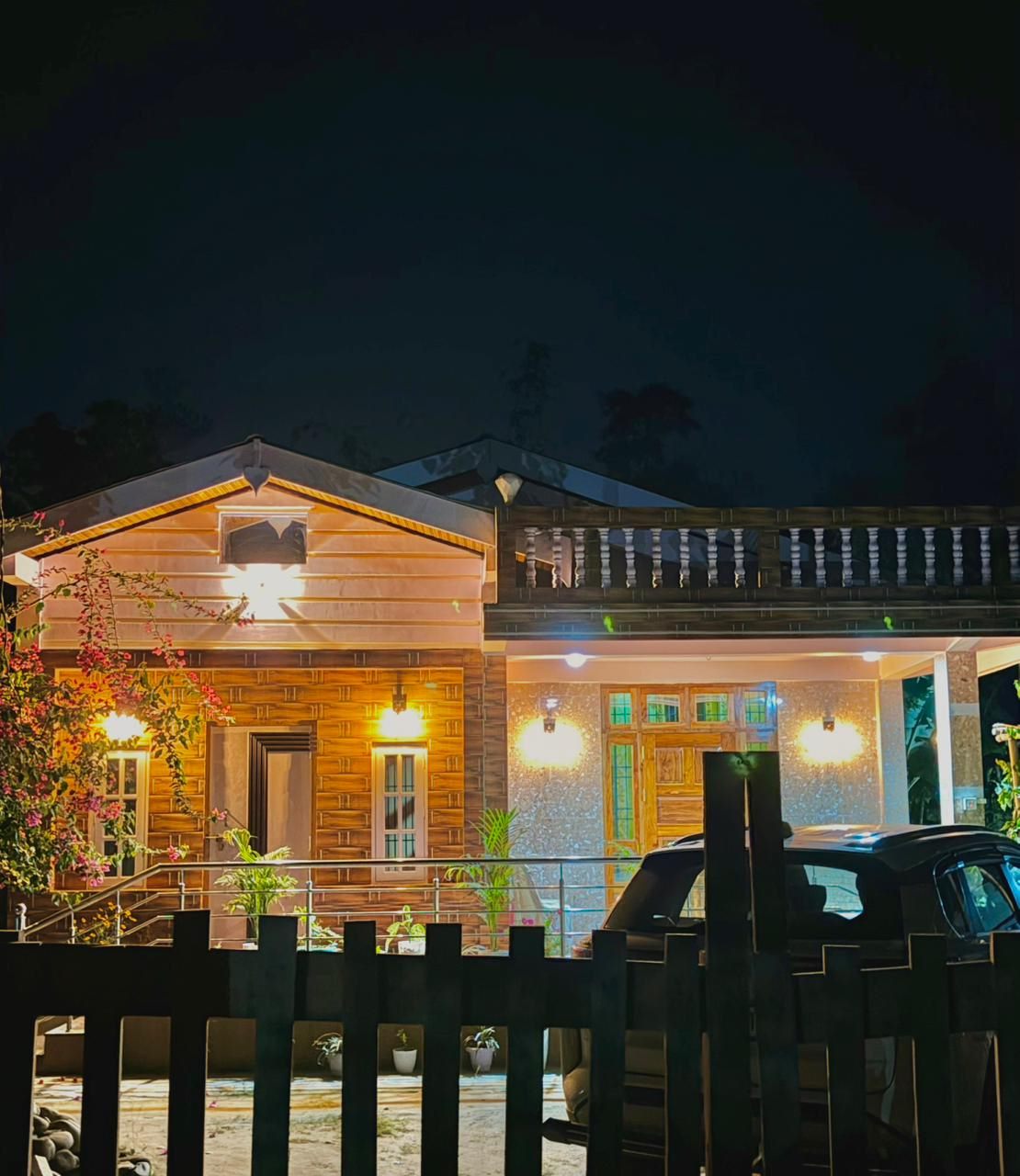 The finished home, lit up at night — The Silapathar Residence, Silapathar, Assam