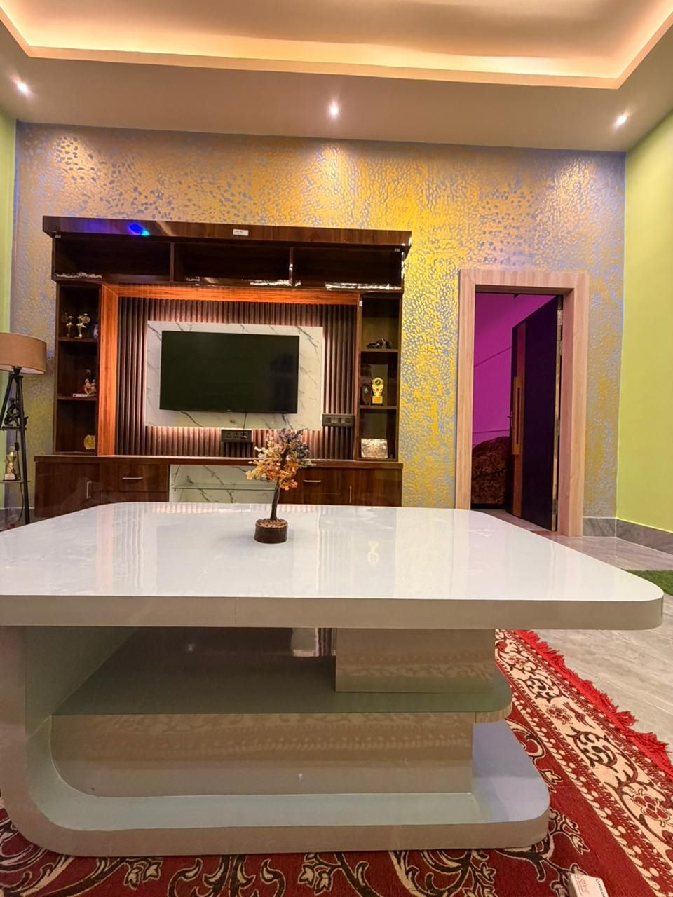 Built-in TV unit & textured feature wall — The Silapathar Residence, Silapathar, Assam
